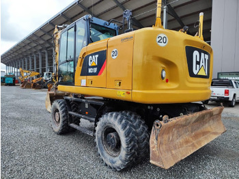 Pelle sur pneus CATERPILLAR M318F