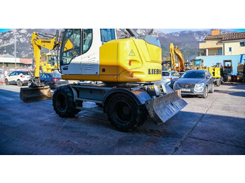 Pelle sur pneus Liebherr A910: photos 4