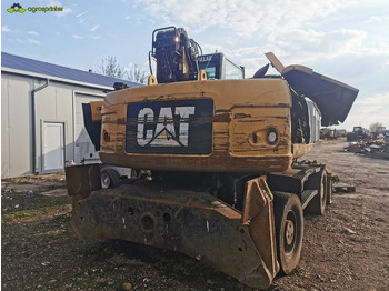 Pelle de manutention CAT M 318 D: photos 4