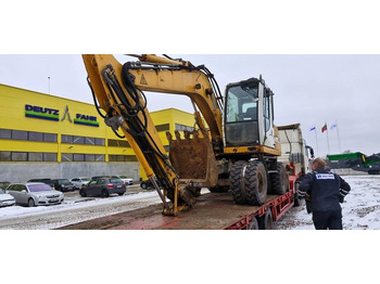 Pelle sur pneus Liebherr A 314: photos 3