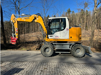 Pelle sur pneus LIEBHERR A 910